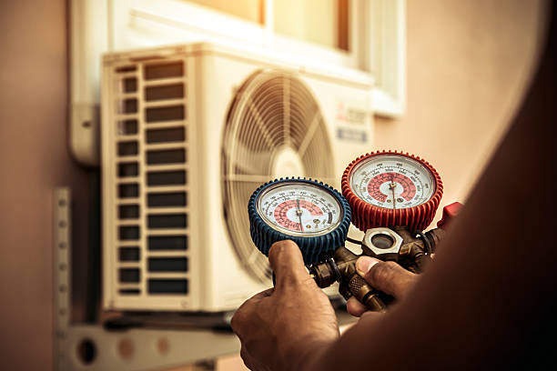 Professional Air Conditioning Service technician working in Sunnyvale, TX